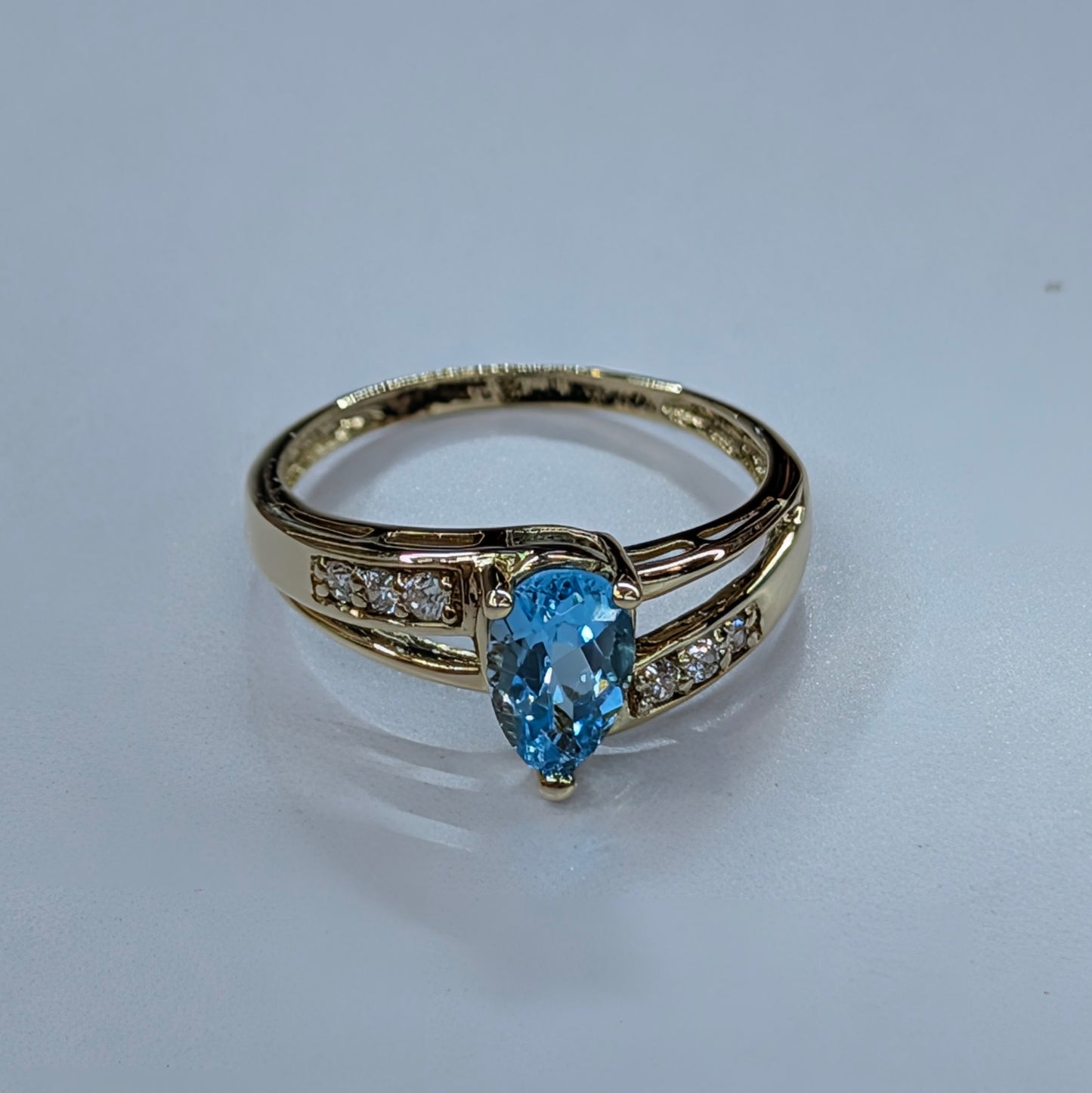 TEARGROP BLUE TOPAZ AND CZ 14K YG RING Sz 7.