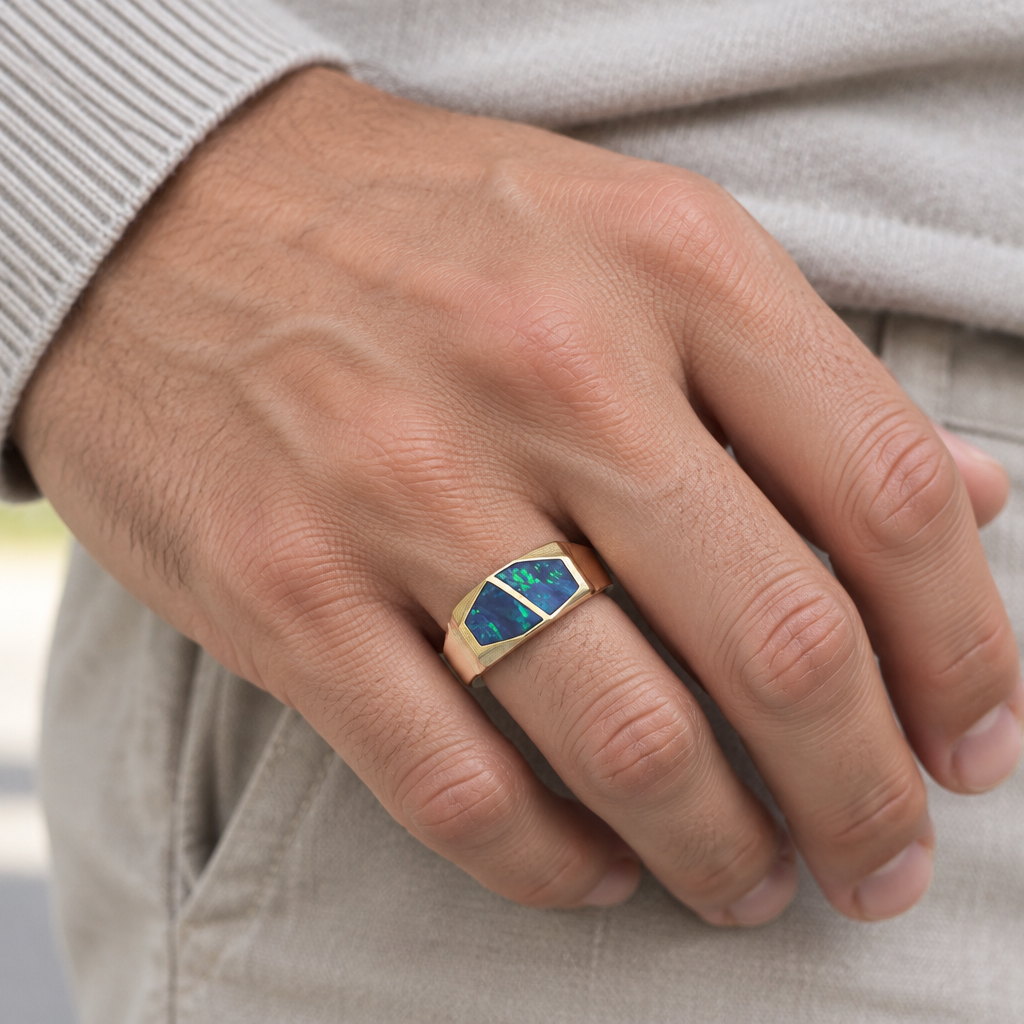 Lifestyle view of yellow gold opal signet ring worn on hand