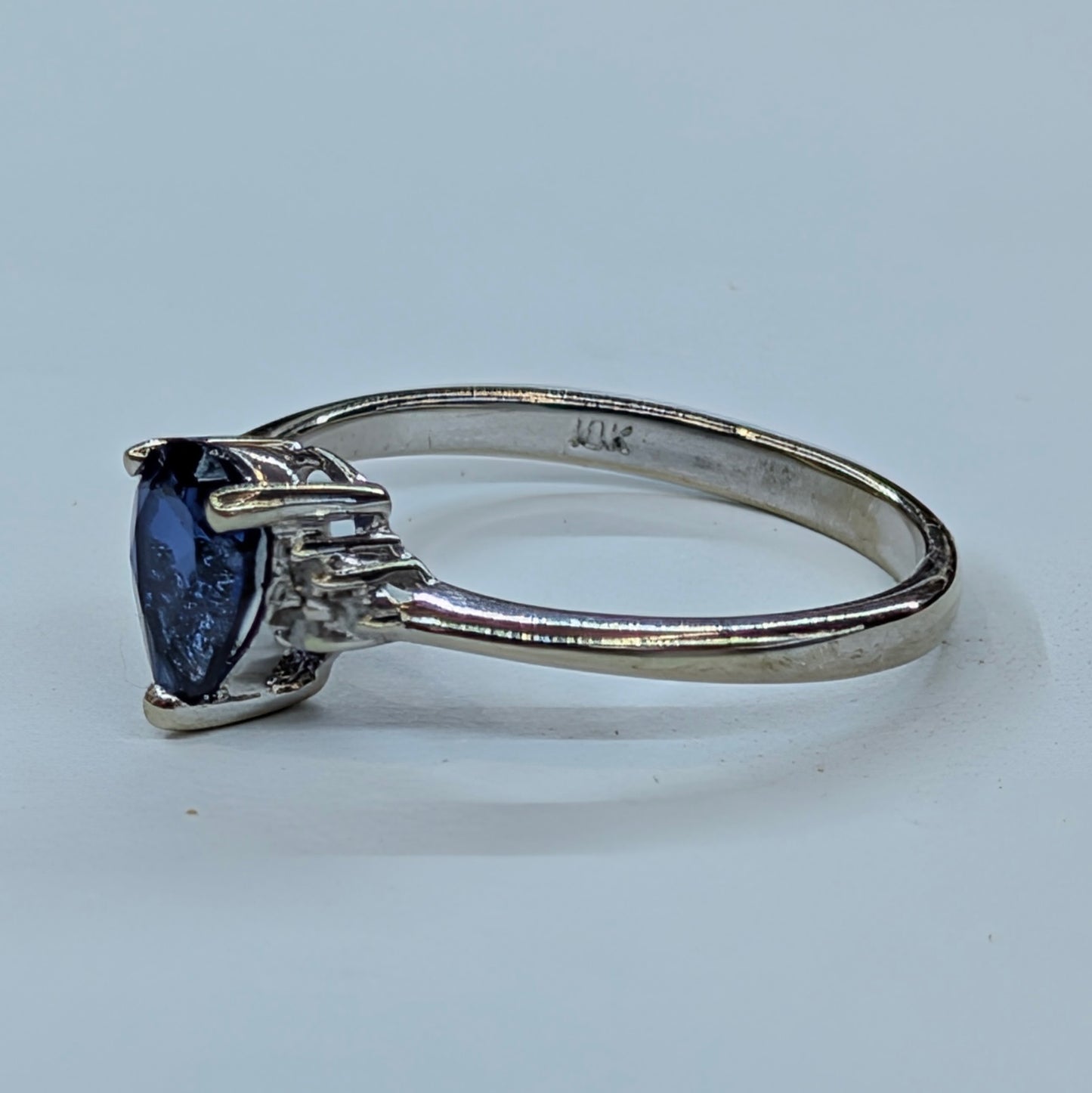 1/2CT Pear-Shaped Sapphire Ring with Diamond Accents – 10K White Gold (Size 7)  Timeless Sophistication in Deep Sapphire Blue