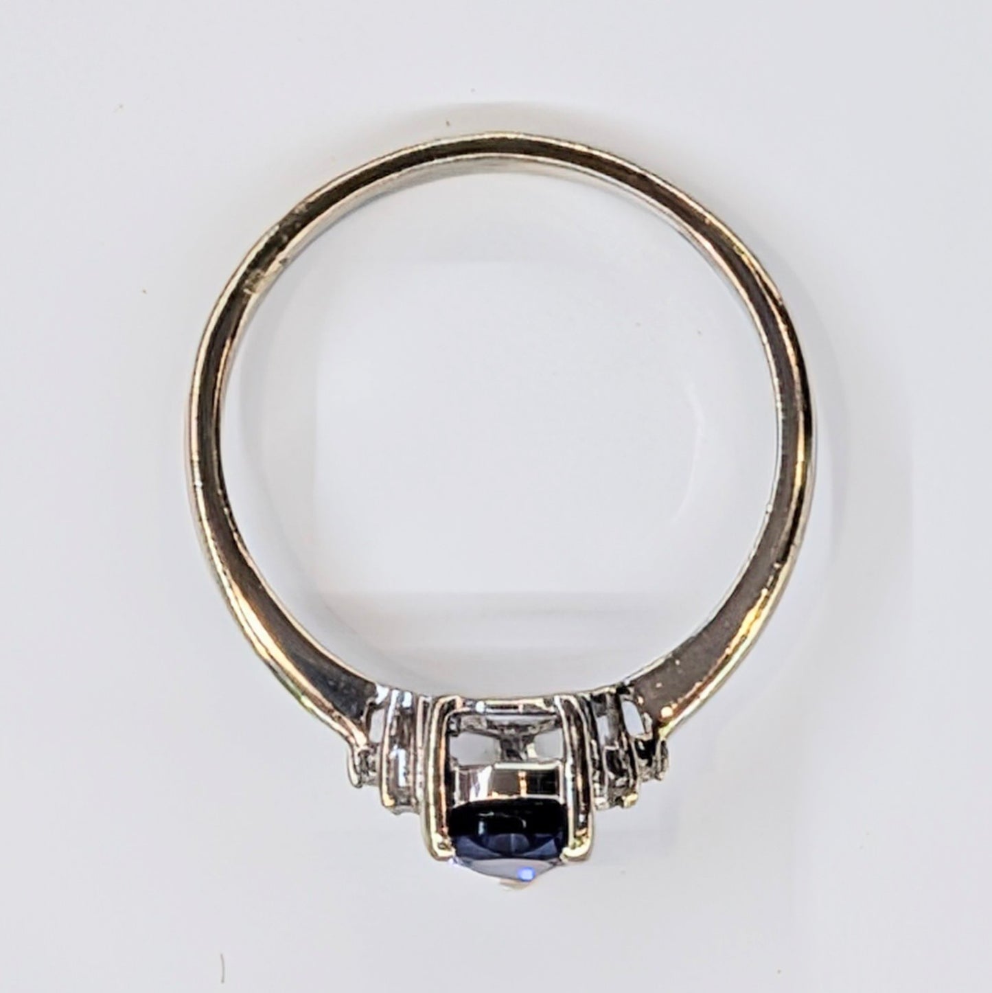 1/2CT Pear-Shaped Sapphire Ring with Diamond Accents – 10K White Gold (Size 7)  Timeless Sophistication in Deep Sapphire Blue