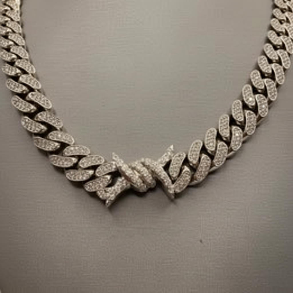 Close-up detail of the diamond-set links and clasp on a 10K white gold chain