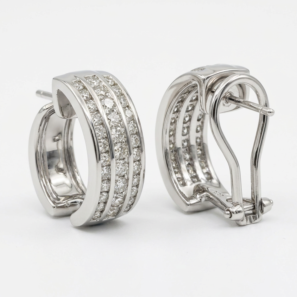 Side and reverse view of R2414 white gold diamond earrings showing omega-clip backs and posts