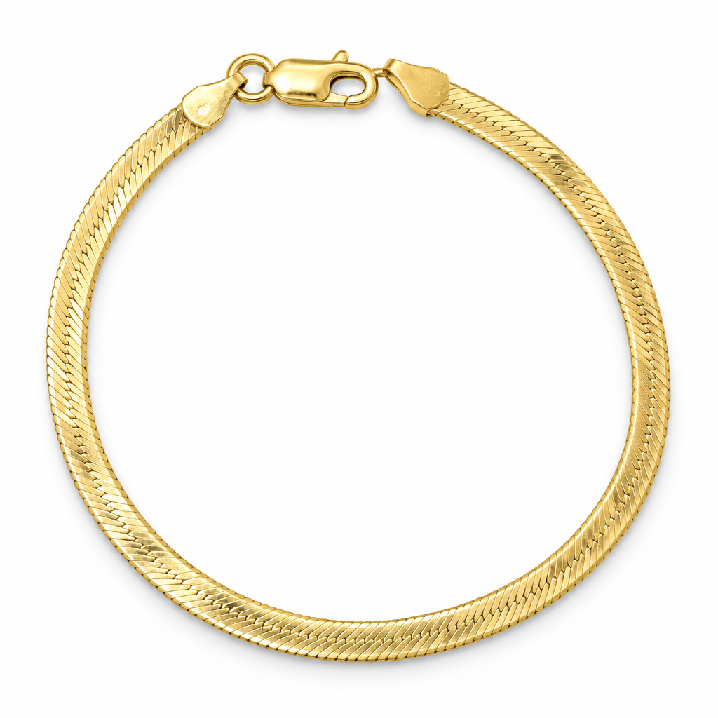 14K yellow gold herringbone bracelet in an oval on white background