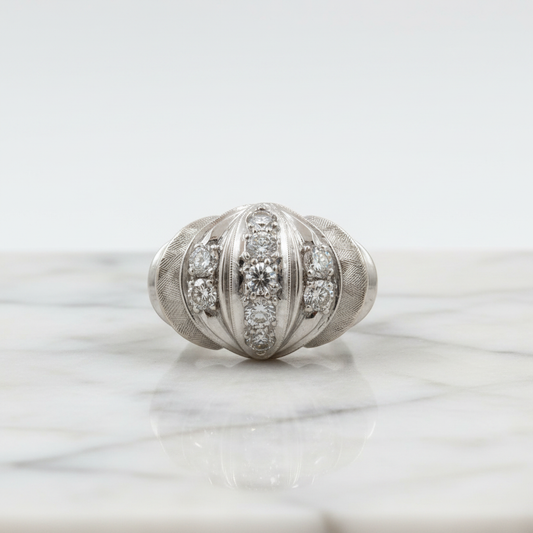 14K White Gold Diamond Ring on white marble – studio shot