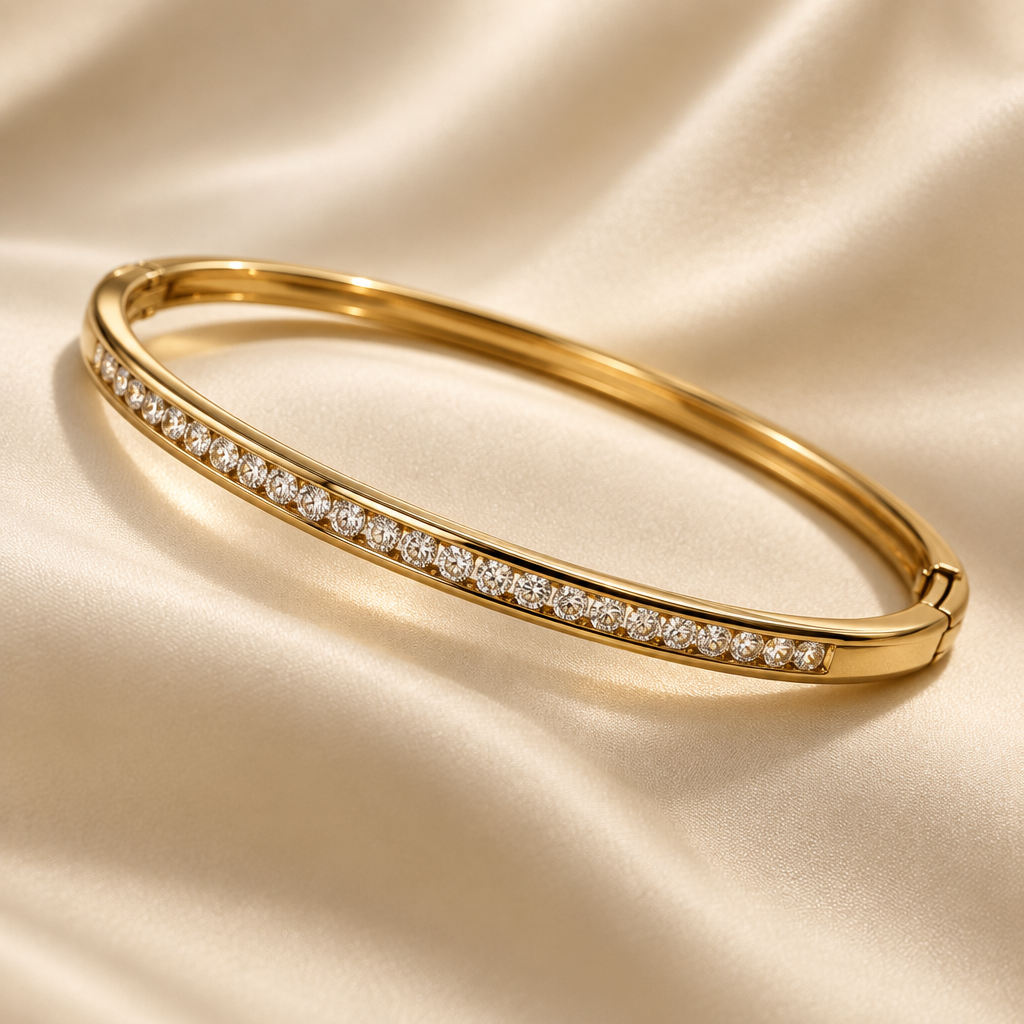 Gold diamond bangle styled on cream silk