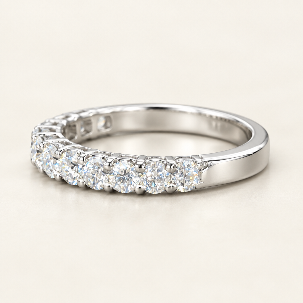 Side detail of the white gold diamond band's prong setting