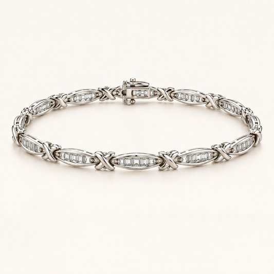 14K white gold baguette diamond X-link bracelet arranged on a warm white background