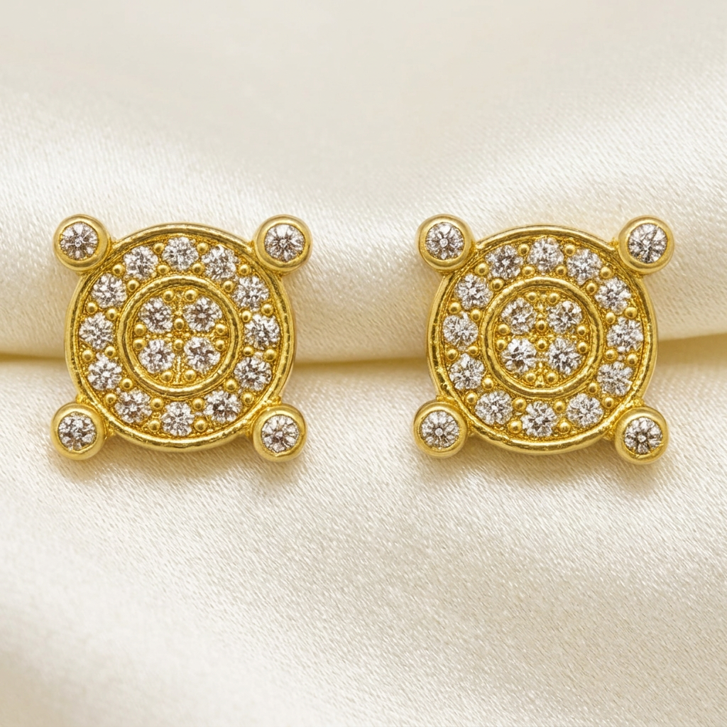 Diamond compass stud earrings in yellow gold on ivory satin