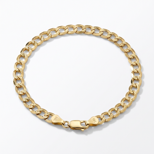 14K yellow gold diamond-cut curb link bracelet on a white background