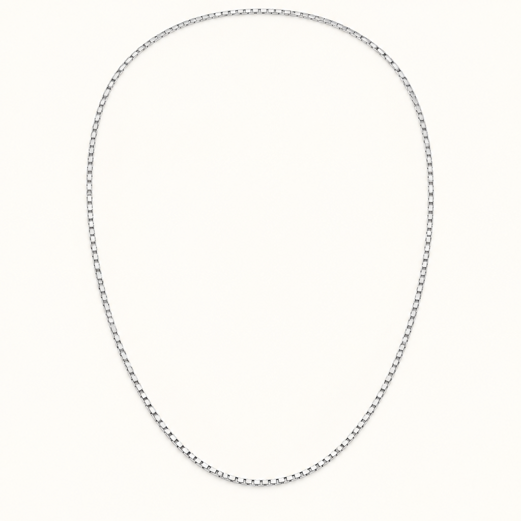 24-inch 14K white gold box link chain on ivory background