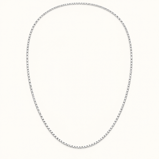 24-inch 14K white gold box link chain on ivory background