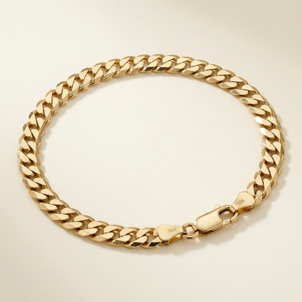 Angled studio view of R2395 yellow gold Cuban link bracelet with lobster clasp
