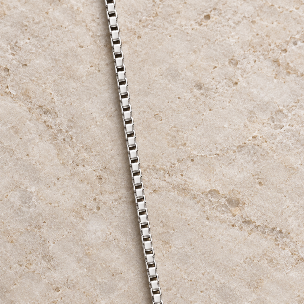 Close-up of 14K white gold box links