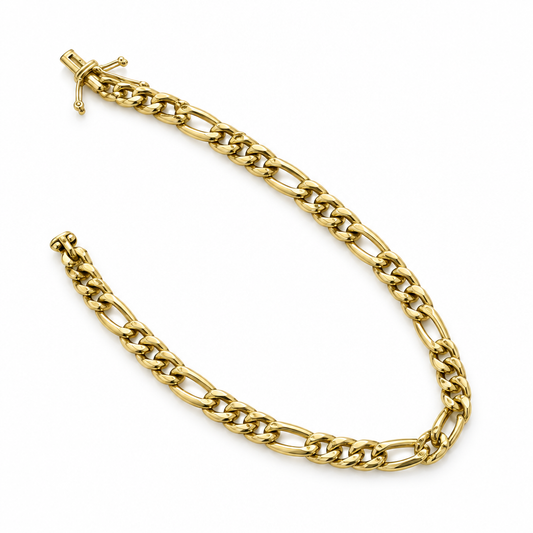 10K solid yellow gold Figaro bracelet on white background