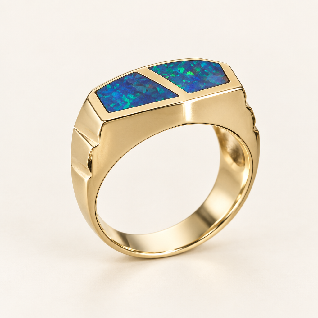 Side view of yellow gold signet ring with blue-green opal inlay