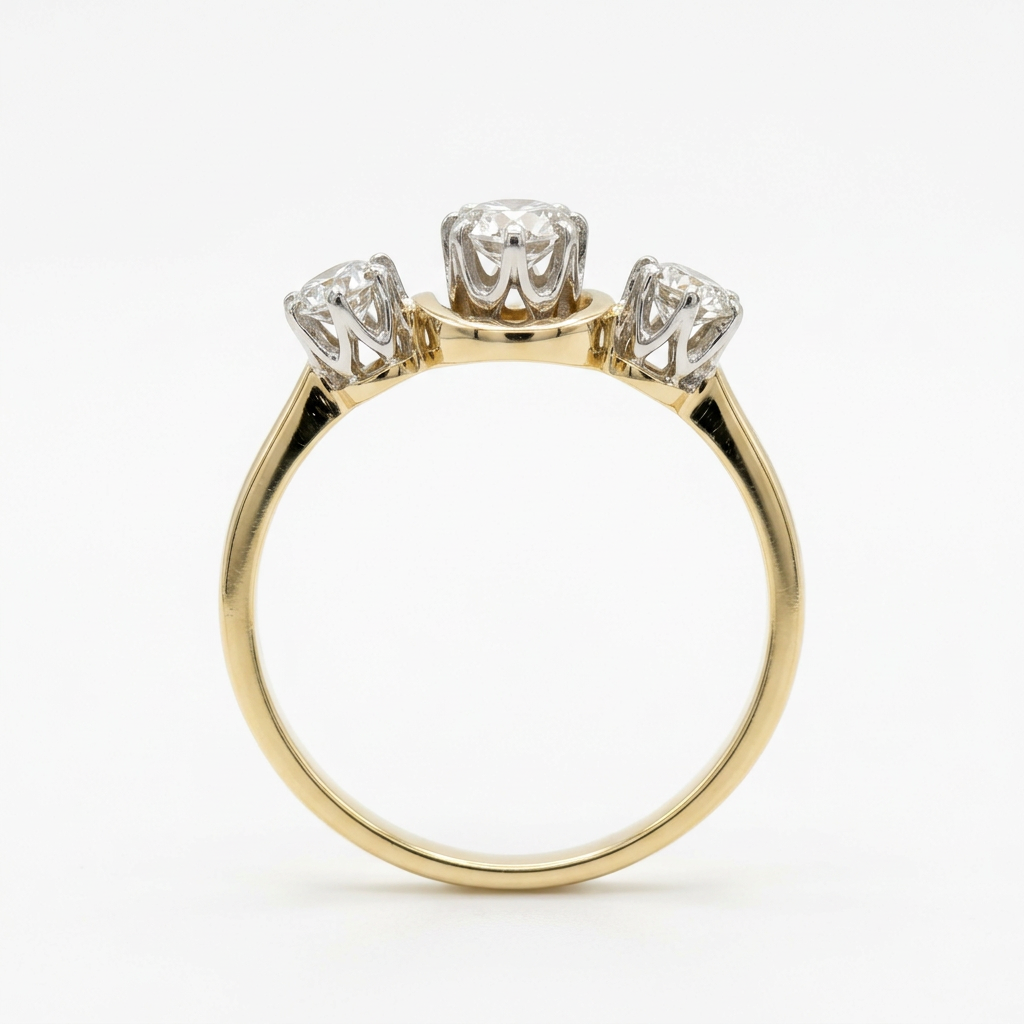 Side profile of R2448 yellow gold ring showing raised diamond settings