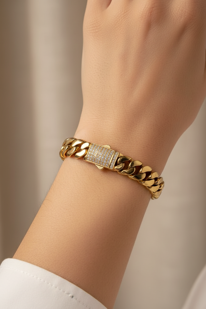 10K yellow gold Cuban link bracelet worn on a wrist