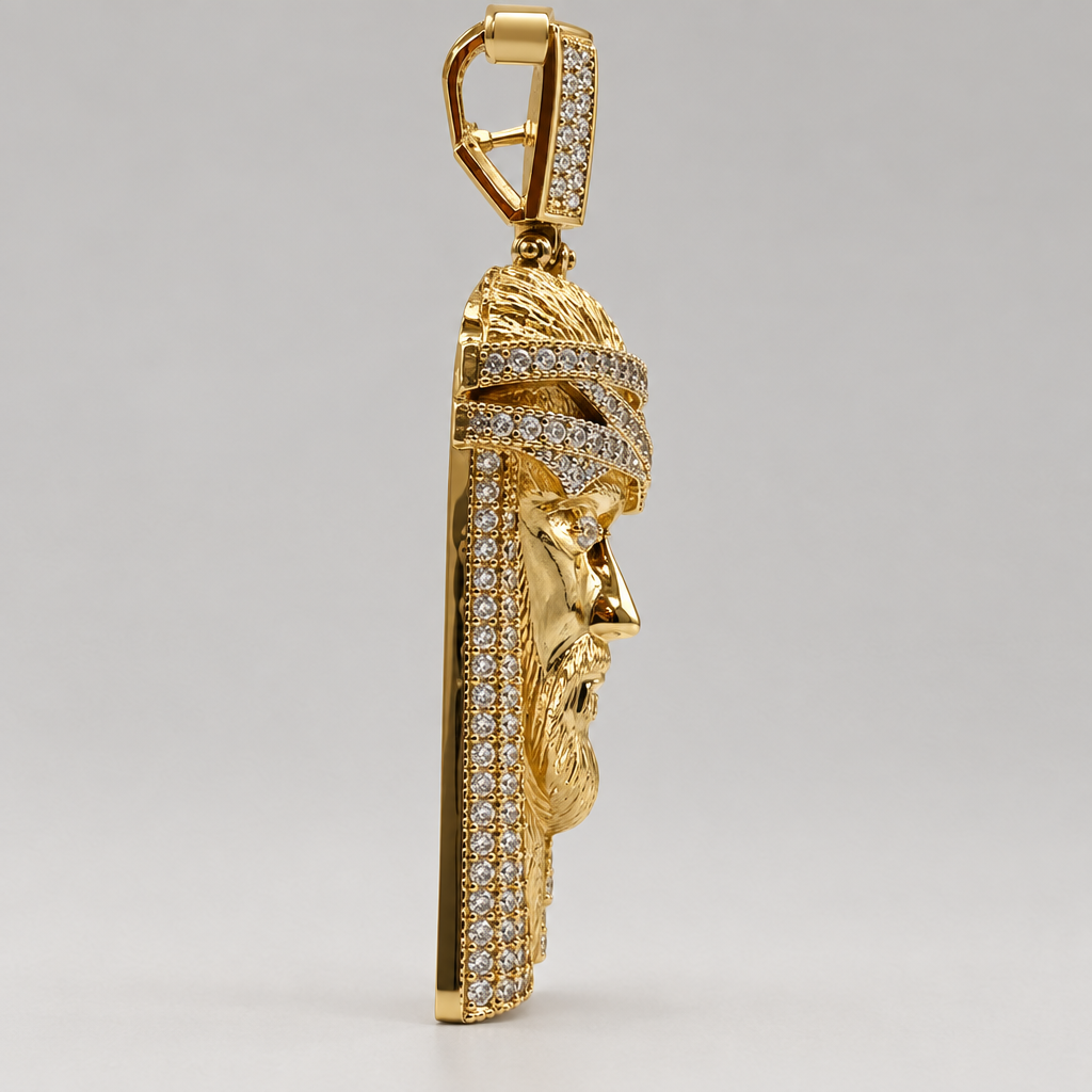 Side profile showing the sculpted relief of a 10K yellow gold CZ Jesus head charm