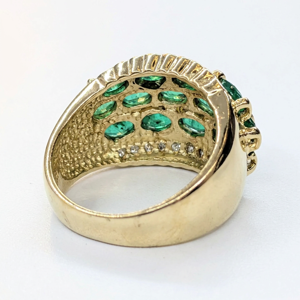 Rear view of G096 showing tapered gold band and open gemstone gallery
