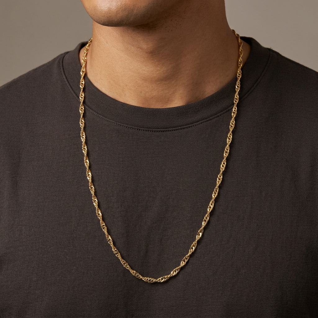 30-inch yellow gold quasi-rope necklace styled over a dark shirt