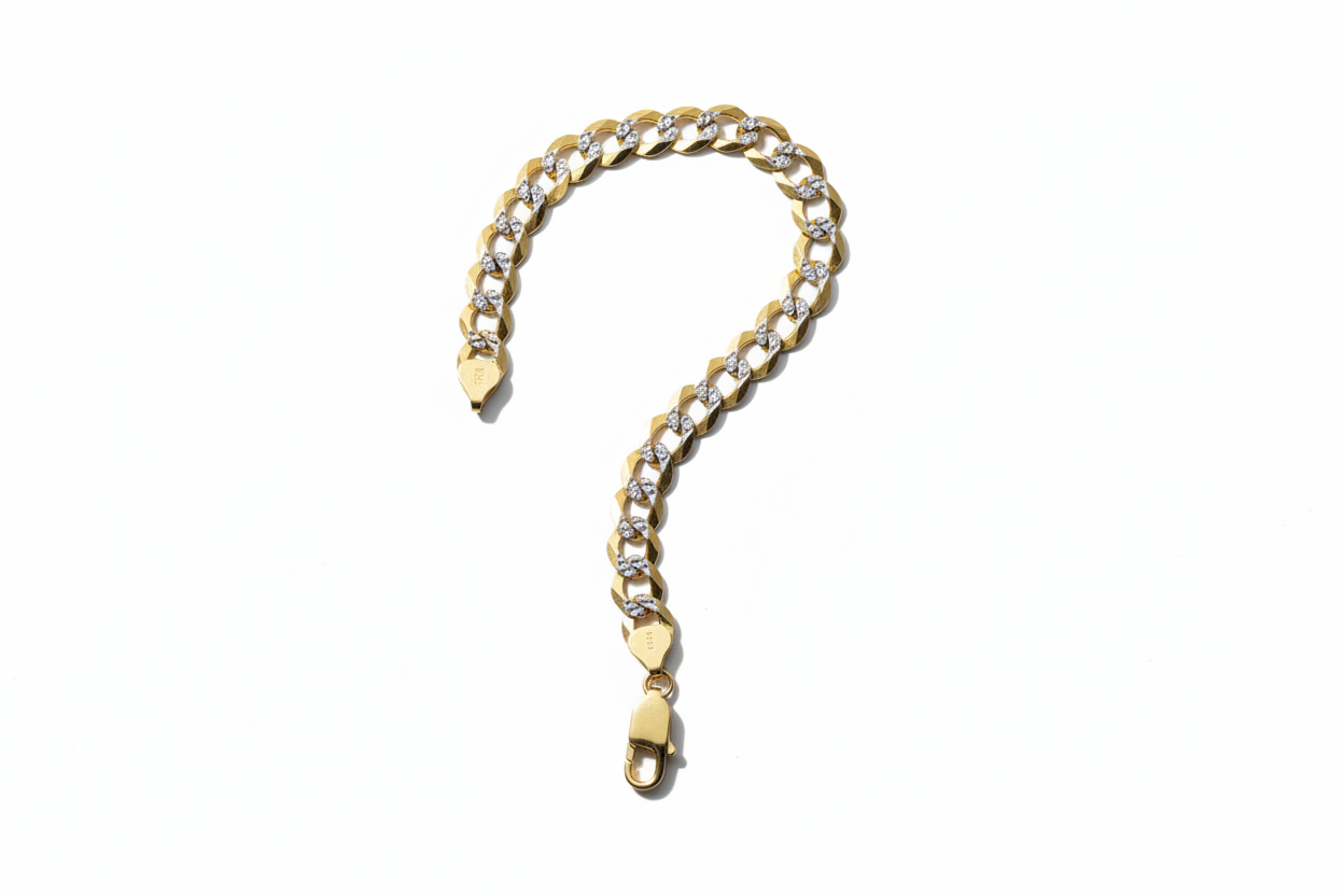 Full length view of 14K two-tone curb link bracelet with lobster clasp