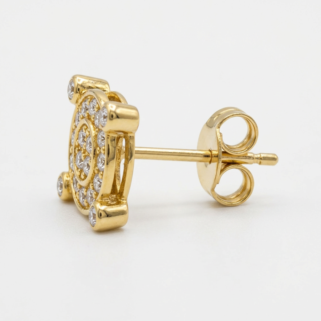 Side profile of 14K yellow gold diamond compass stud earring showing setting depth, post and butterfly back