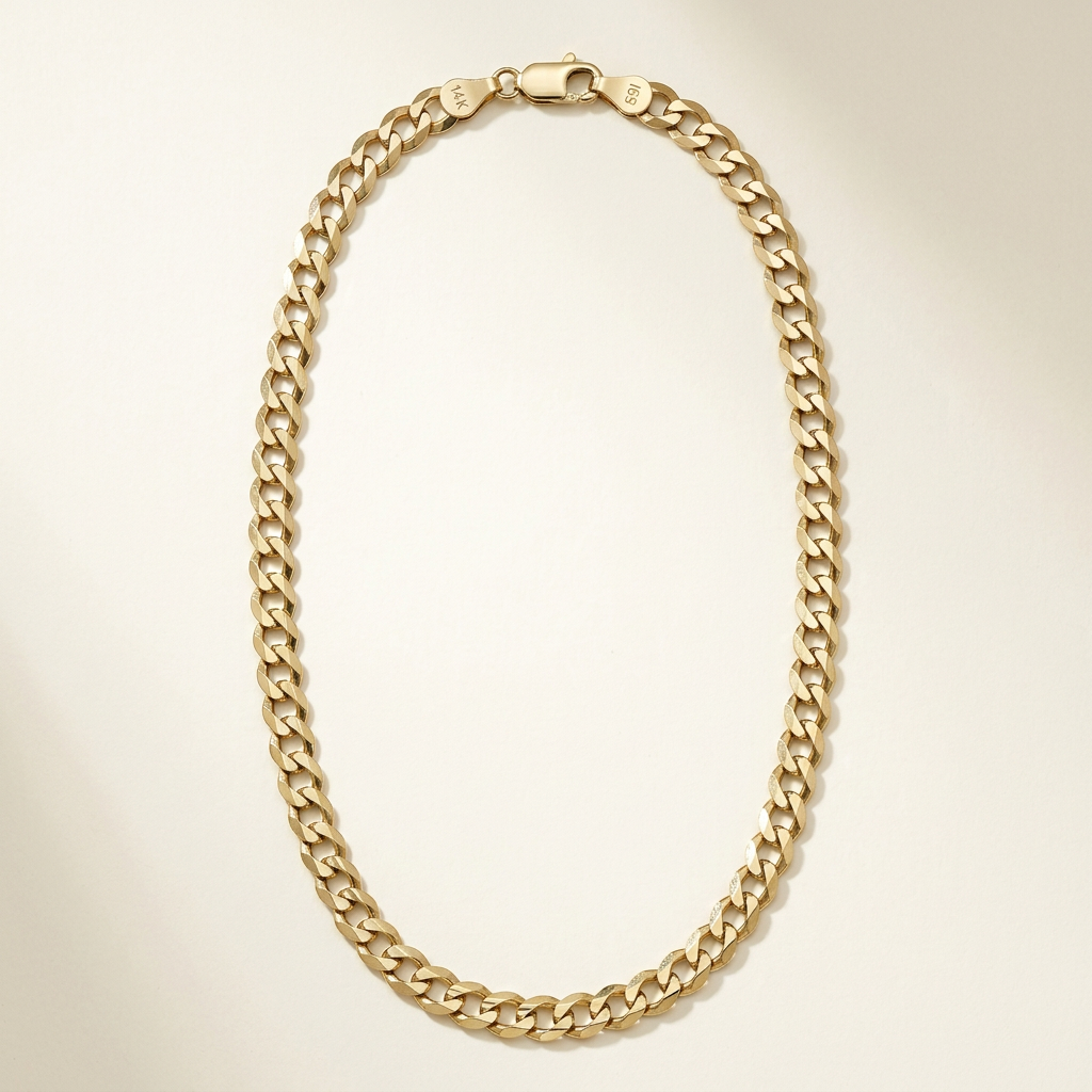 14K yellow gold 5.8mm curb chain necklace arranged in an elongated oval