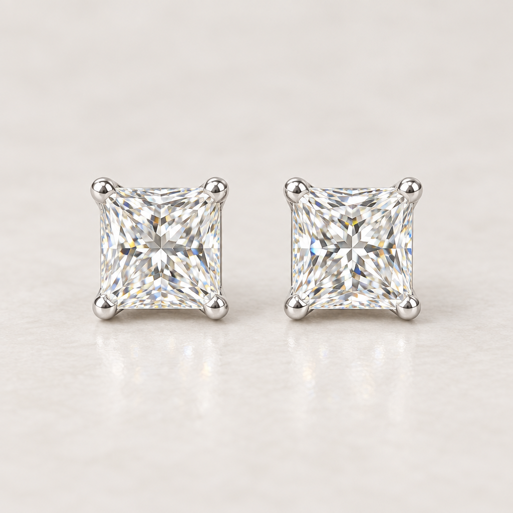 Pair of square lab-grown diamond stud earrings in four-prong 14K white-gold settings, front view