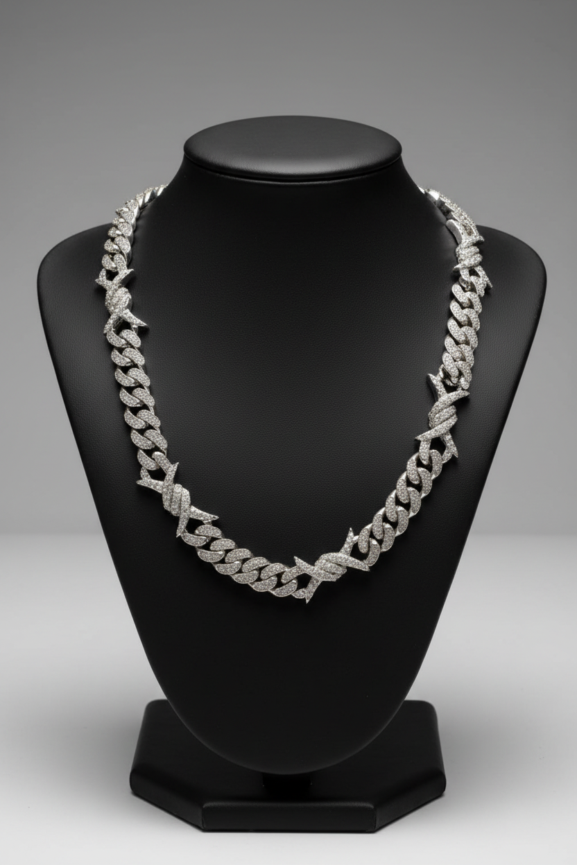 10K white gold diamond Cuban-link chain displayed on a black jewelry bust