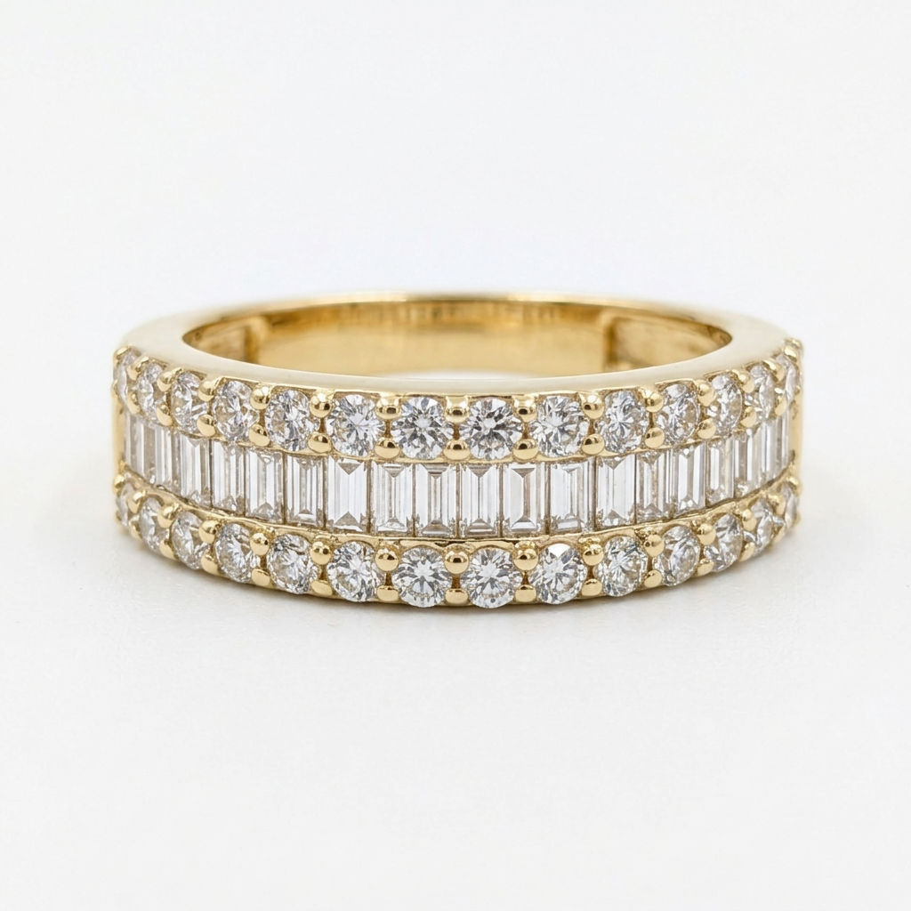 Front detail of the three-row baguette and round diamond band in 14K yellow gold