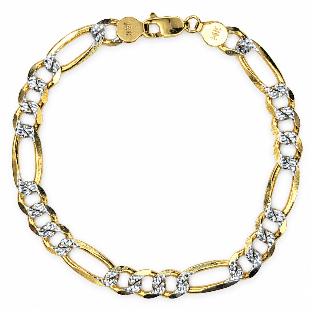 Detailed view of yellow gold Figaro bracelet and diamond-cut links