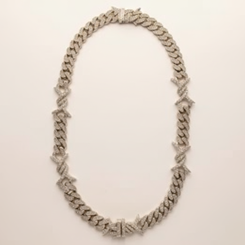 10K white gold diamond Cuban-link chain arranged in an oval on a warm white studio background