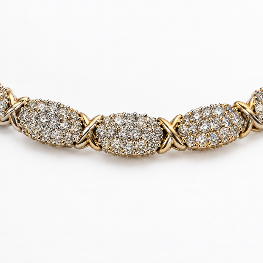 Close-up of diamond cluster links and yellow gold connectors