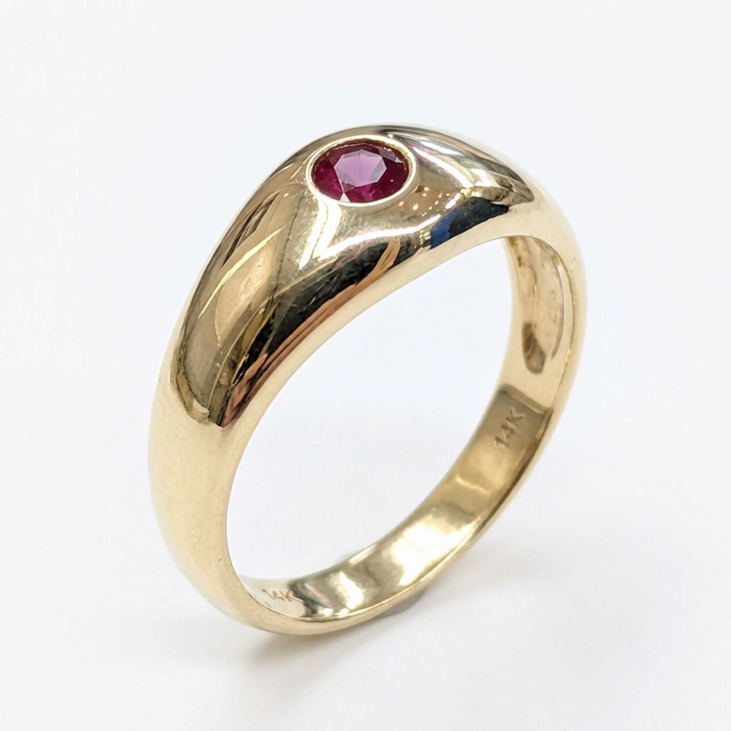 14K yellow gold ruby signet ring, three-quarter studio view