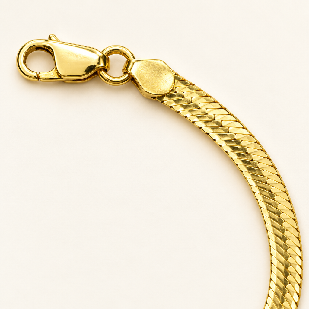 Close-up of lobster clasp and flat herringbone links